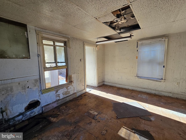 empty room with a drop ceiling