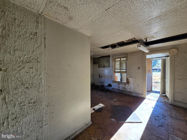 kitchen featuring a drop ceiling