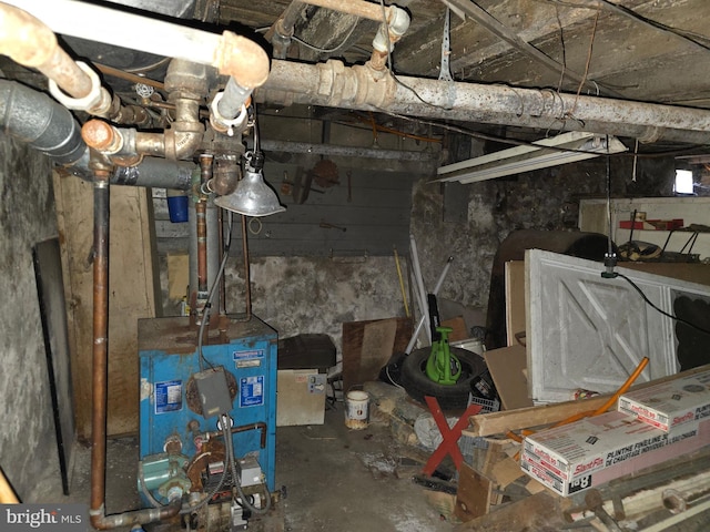 unfinished basement with a heating unit