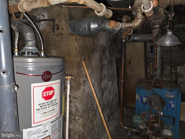 utility room with gas water heater