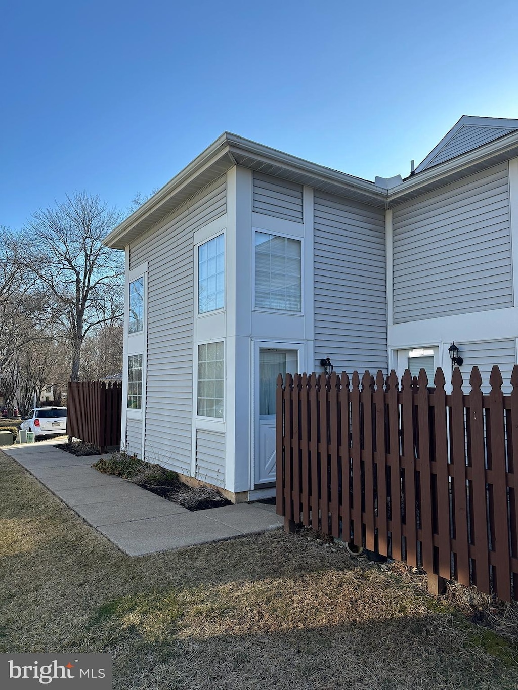 view of side of property with fence