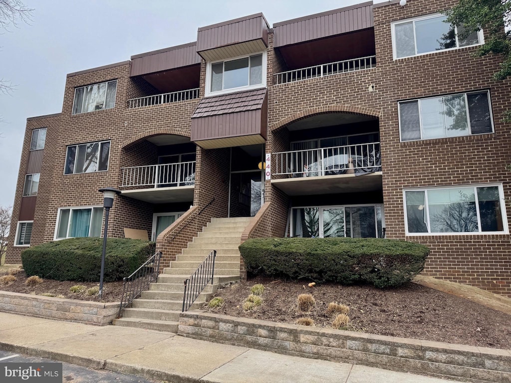 view of building exterior with stairway