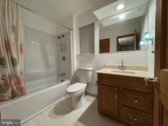 full bathroom featuring tile patterned floors, vanity, toilet, and shower / tub combo