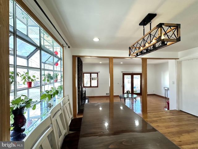 foyer with recessed lighting, french doors, baseboards, and dark wood-type flooring