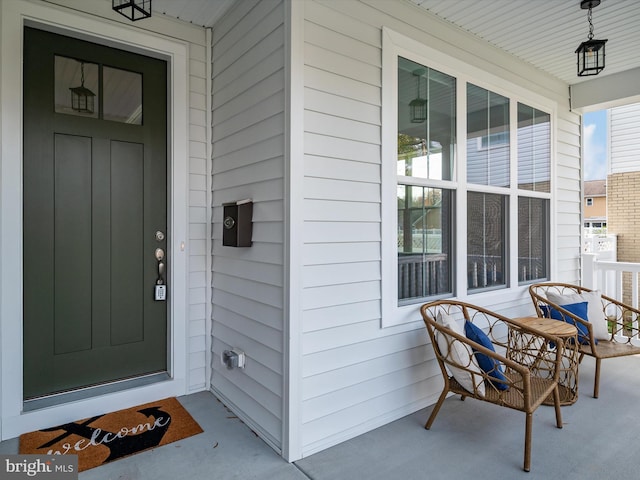 entrance to property with a porch