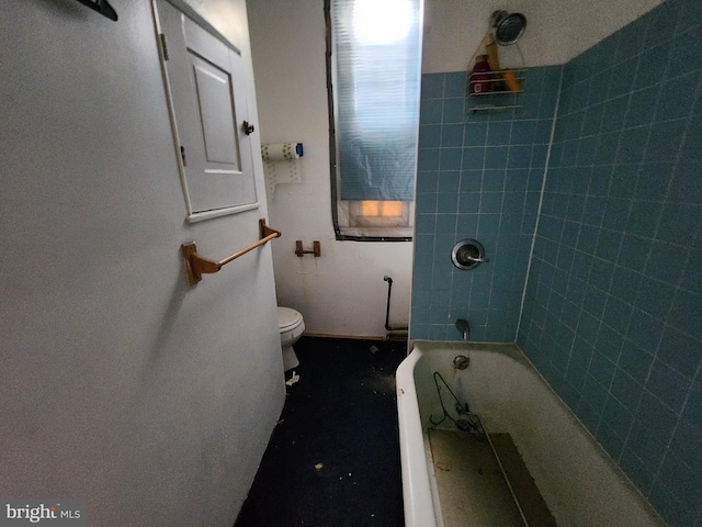 bathroom with toilet and shower / tub combination