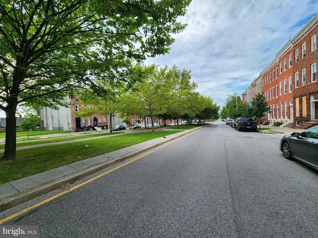 view of street featuring sidewalks and curbs