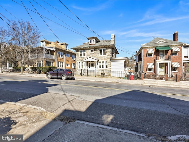 view of street with sidewalks and curbs