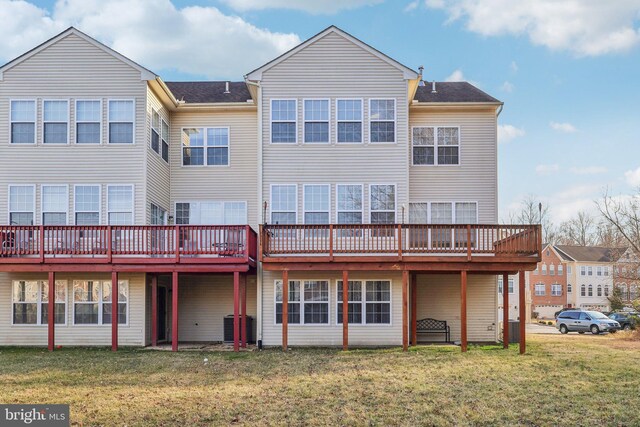 107 Persimmon Pl, Bear, DE 19701 - back of house with central AC unit, a wooden deck, and a yard