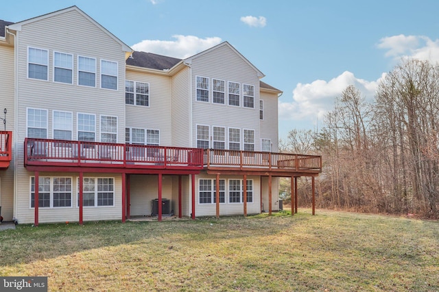 107 Persimmon Pl, Bear, DE 19701 - back of house featuring central air condition unit, a wooden deck, and a yard