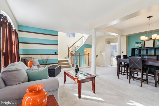 107 Persimmon Pl, Bear, DE 19701 - living area featuring decorative columns, baseboards, carpet flooring, and stairway