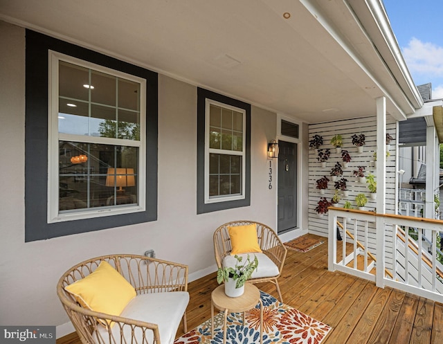 wooden deck featuring a porch