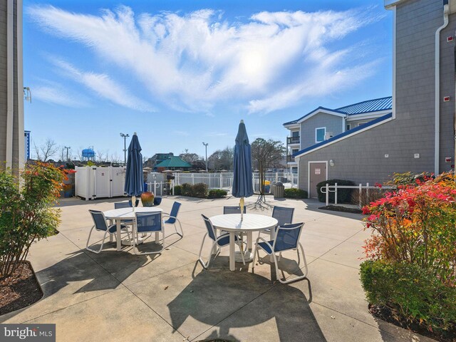 view of patio with fence