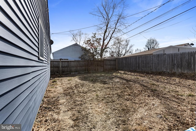 view of yard featuring a fenced backyard