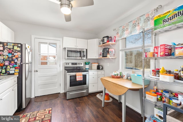 kitchen featuring white cabinetry, dark wood-type flooring, light countertops, and appliances with stainless steel finishes