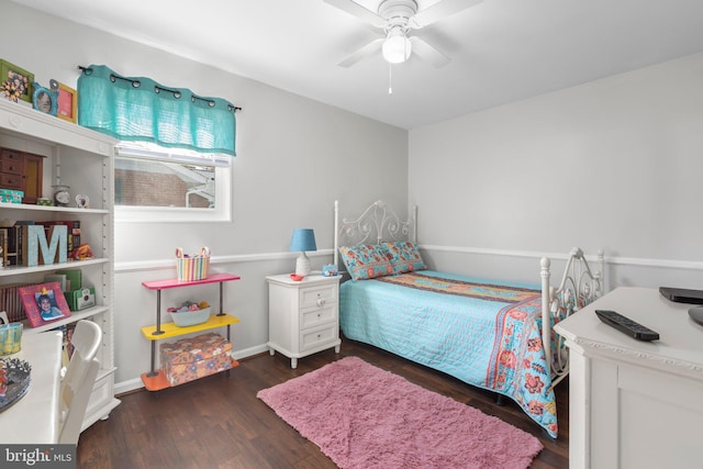 bedroom with ceiling fan and wood finished floors