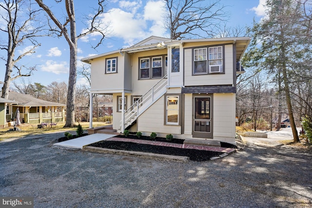 view of front of property with stairway