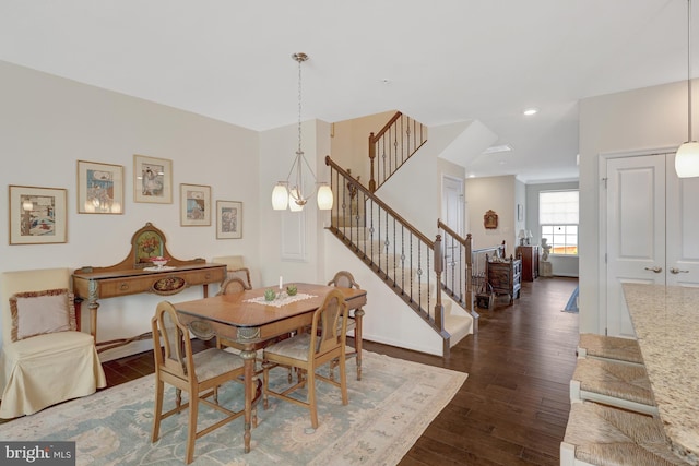 dining space with stairs, recessed lighting, and dark wood-style floors