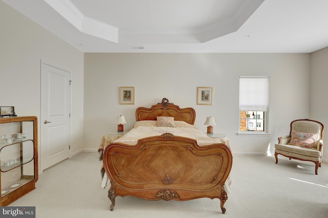 bedroom with light carpet, a raised ceiling, baseboards, and ornamental molding