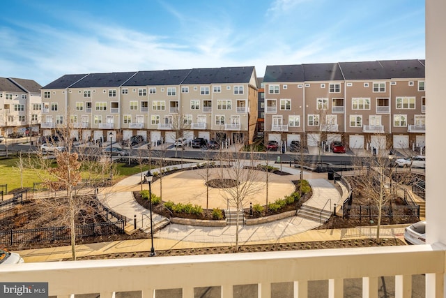 view of building exterior with a residential view