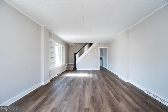 unfurnished living room featuring stairway, dark wood-style flooring, baseboards, and a baseboard radiator