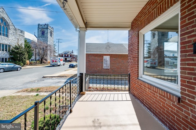 balcony featuring a porch