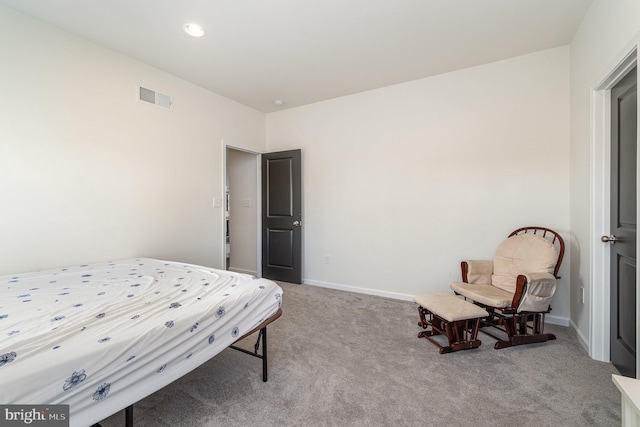 bedroom featuring visible vents, baseboards, and carpet flooring