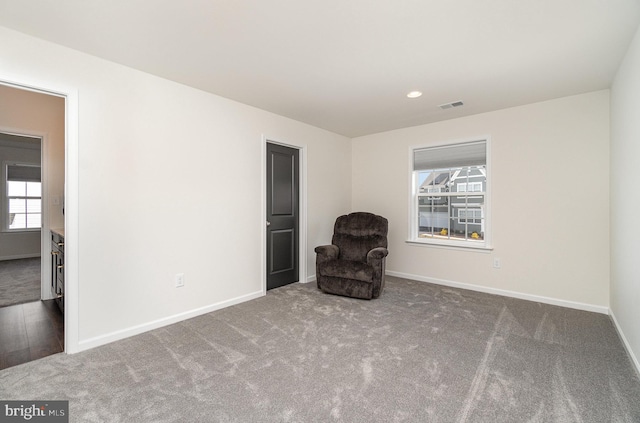 unfurnished room with recessed lighting, visible vents, baseboards, and carpet flooring