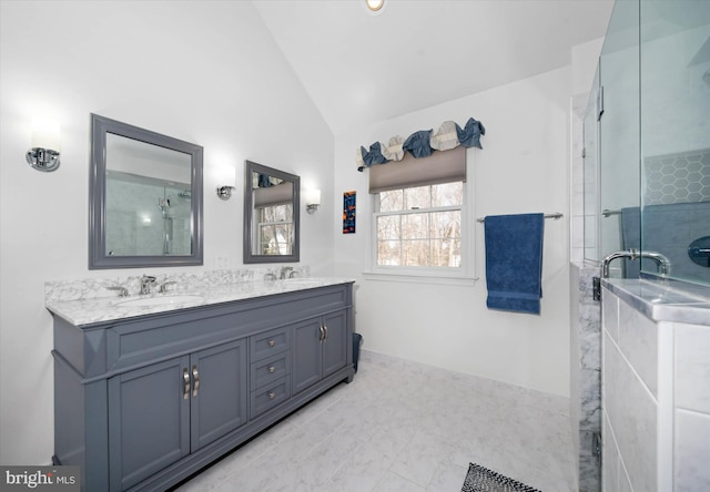 full bathroom featuring a sink, lofted ceiling, and a stall shower