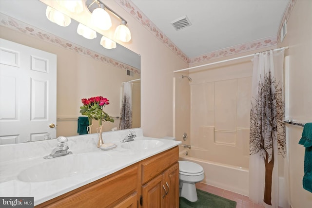 bathroom featuring a sink, visible vents, tile patterned floors, and shower / bath combination with curtain