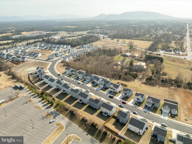 bird's eye view with a mountain view and a residential view