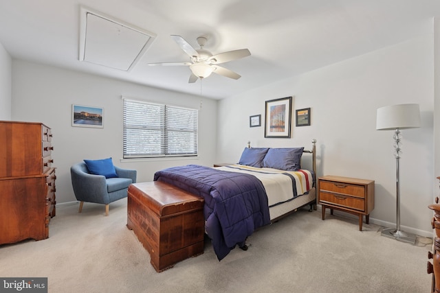 bedroom with baseboards, light carpet, and a ceiling fan