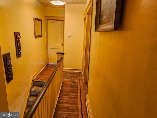 hall with dark wood-style floors