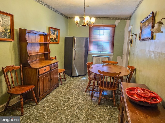 dining room featuring an inviting chandelier