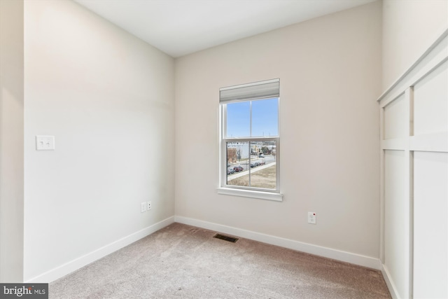 unfurnished bedroom featuring a closet, visible vents, carpet flooring, and baseboards