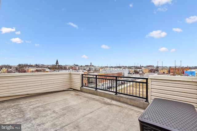 view of patio / terrace with a balcony