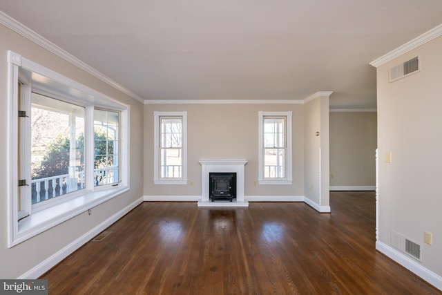 unfurnished living room with dark wood-style floors, visible vents, and baseboards