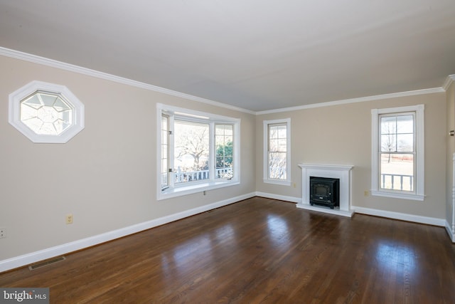 unfurnished living room featuring visible vents, crown molding, baseboards, and dark wood-style flooring