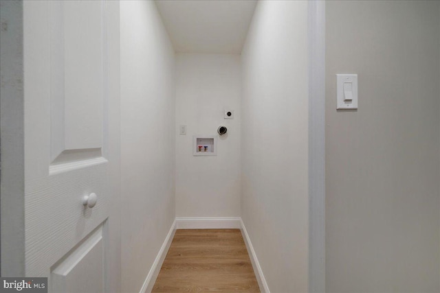 laundry room featuring light wood finished floors, hookup for a washing machine, hookup for an electric dryer, and baseboards