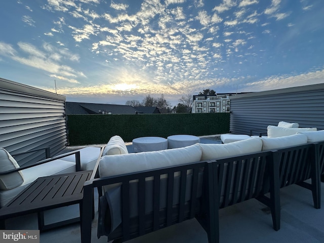 patio terrace at dusk with outdoor lounge area