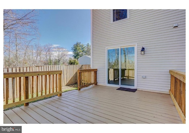 wooden terrace with fence