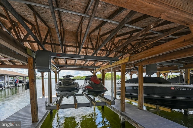 dock area featuring a water view and boat lift