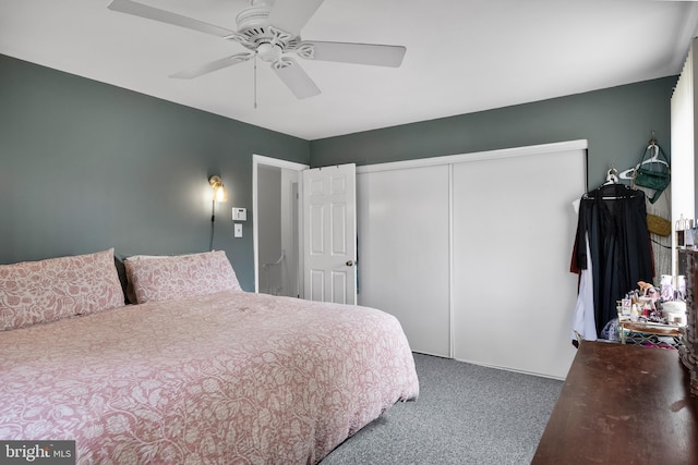 bedroom featuring carpet, a closet, and ceiling fan