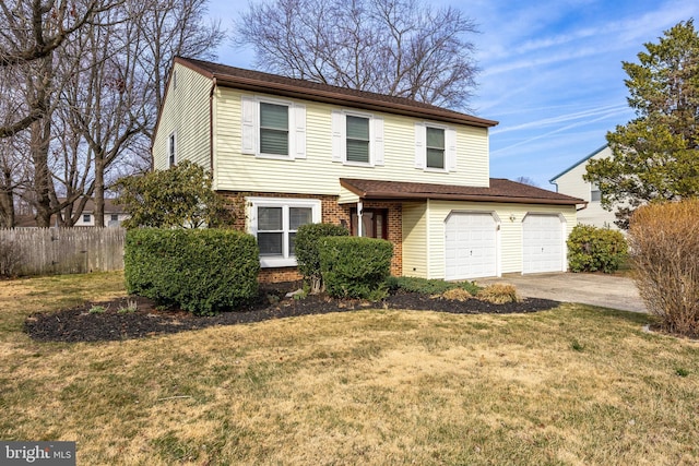 traditional-style house featuring driveway, brick siding, a front yard, and fence