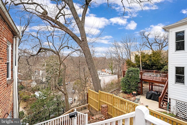 wooden deck featuring grilling area