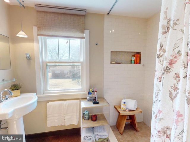 bathroom featuring curtained shower