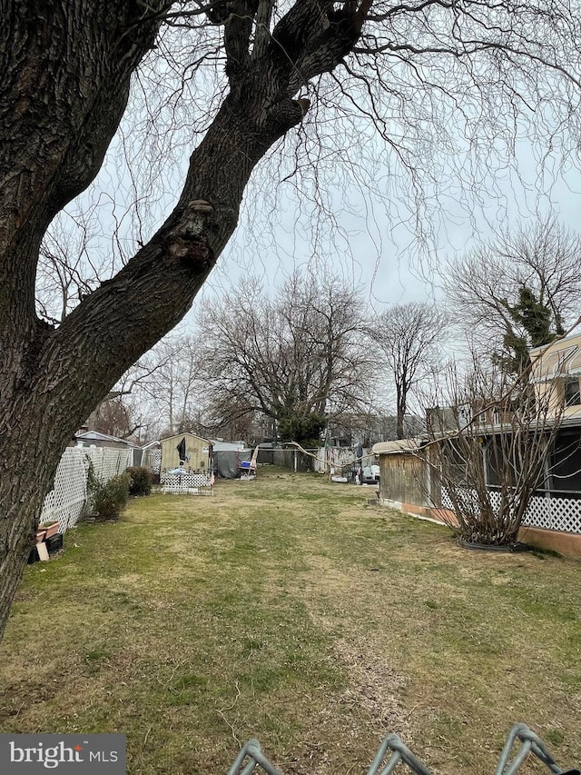 view of yard featuring fence