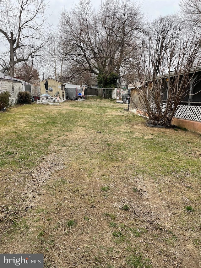 view of yard with fence