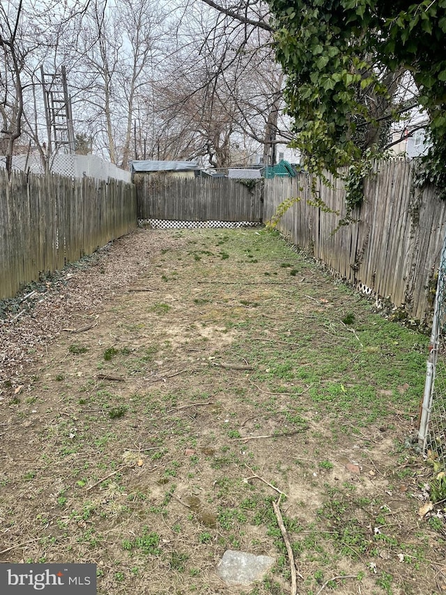 view of yard featuring a fenced backyard