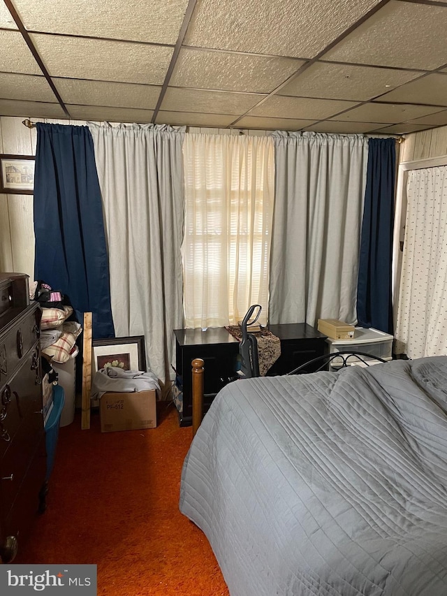 bedroom featuring a drop ceiling